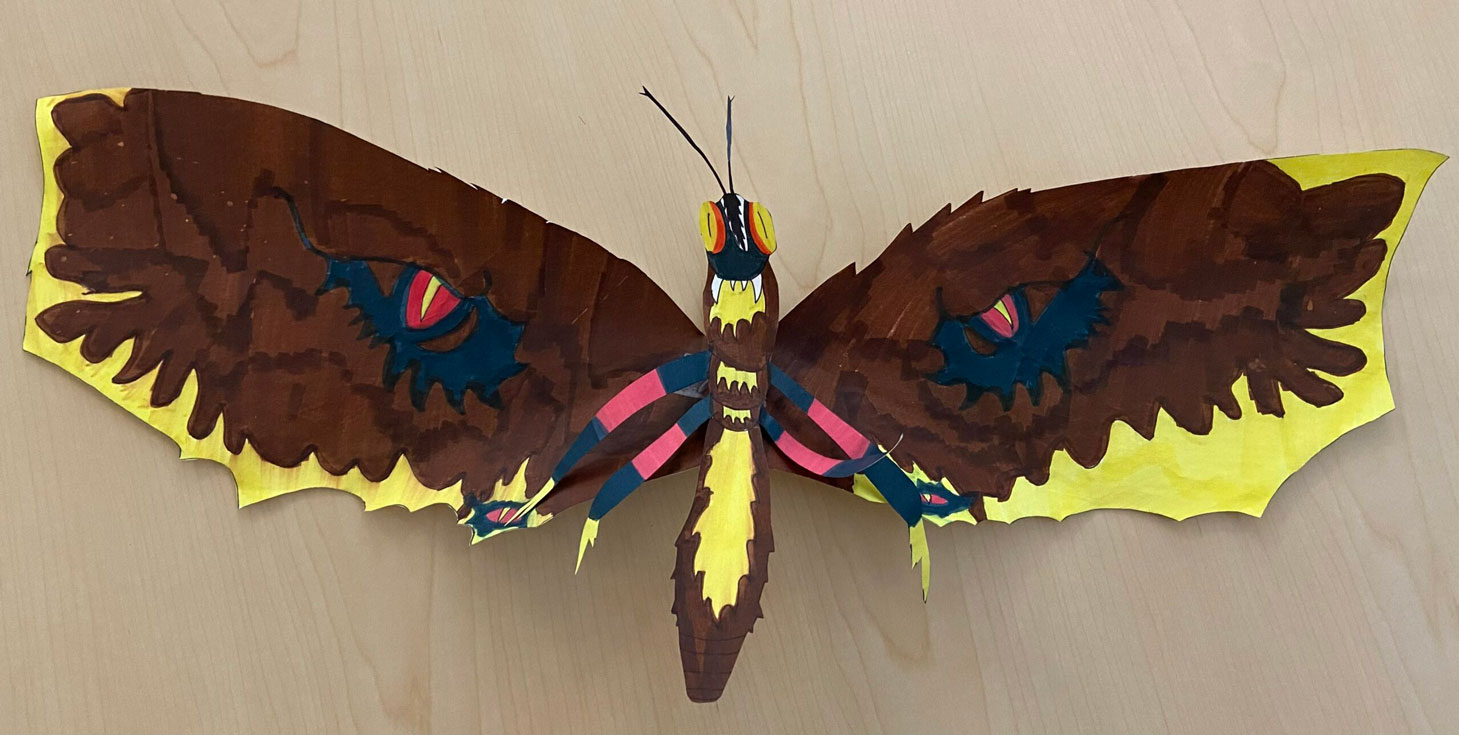 A picture of a child's giant monster butterfly sculpture.