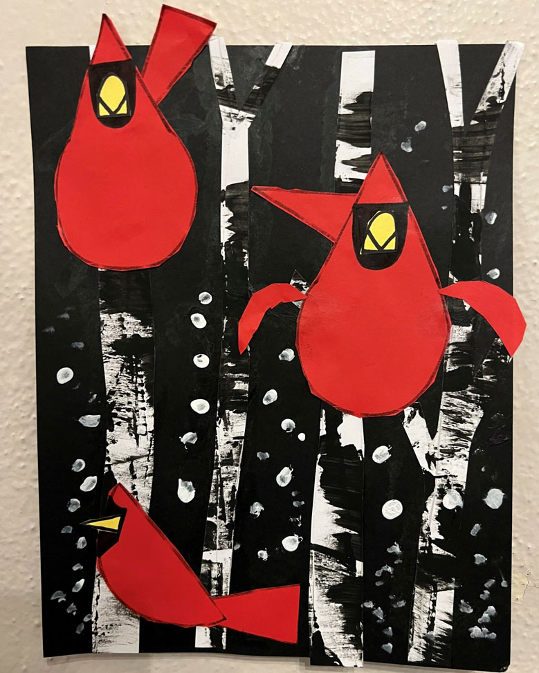An art piece of cardinals in a dark forest.