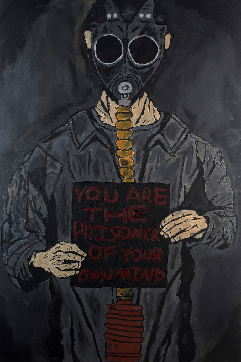 An artwork of a guy in a gas mask, holding a sign that says: "You are the prisoner of your own mind."