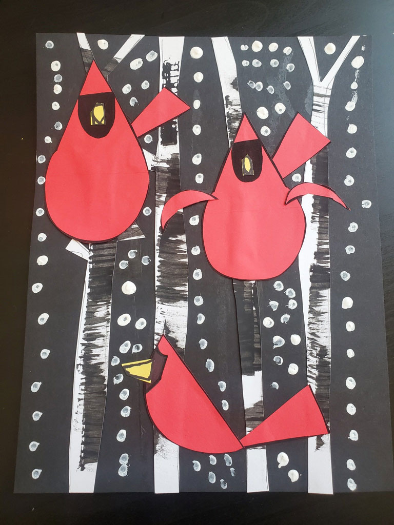 An artwork of cardinals in a dark forest.
