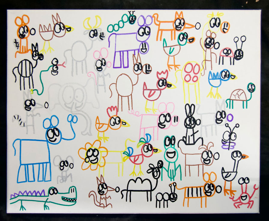 A child's artwork of multicolored drawn animals with smiles drawn on every one.