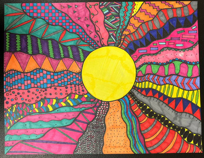 An artwork with a sun in the middle, with rays flowing out with different colors and patterns.