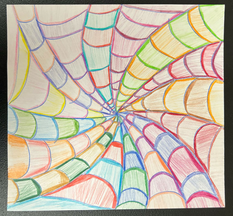 Child's multiple color spiral illusion artwork.