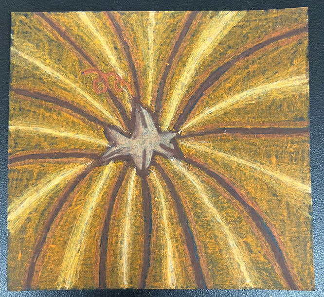 A colored artwork of the top of a pumpkin.